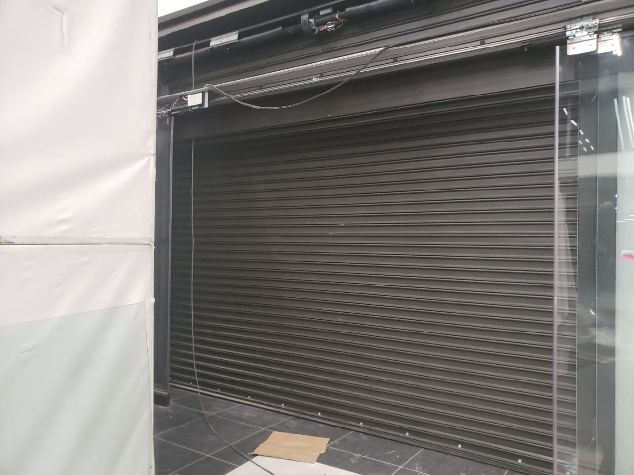 Cortiflejes puerta de local