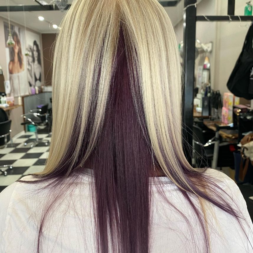 A Woman with Blonde and Purple Hair in A Salon — Ammo Hair and Beauty In Maclean, NSW