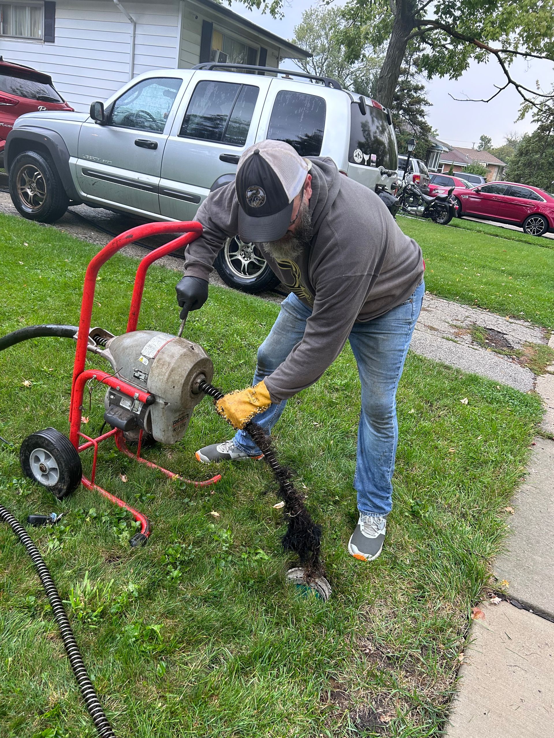 Our Sewer Drain Cleaners Rodding a Sewer Line in Elmhurst
