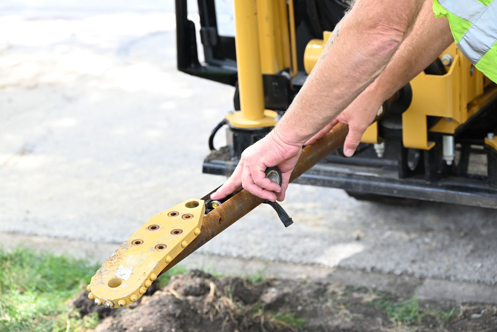 the fair plumber operating a directional boring machine