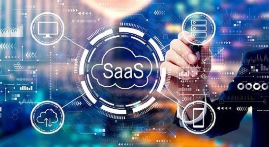 Person drawing around SaaS cloud symbol with connected icons representing different devices and data flow.