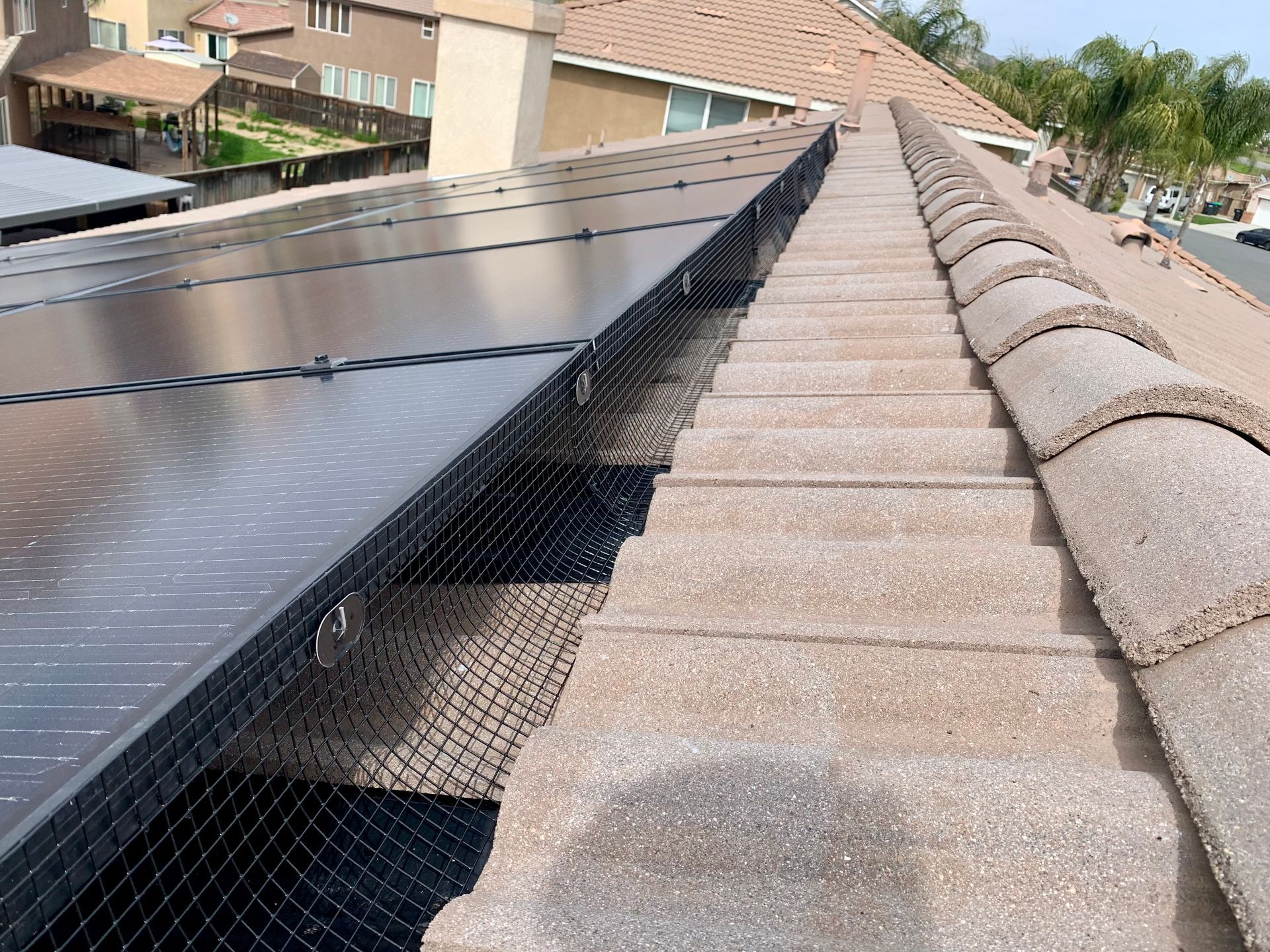 A roof with a lot of solar panels on it