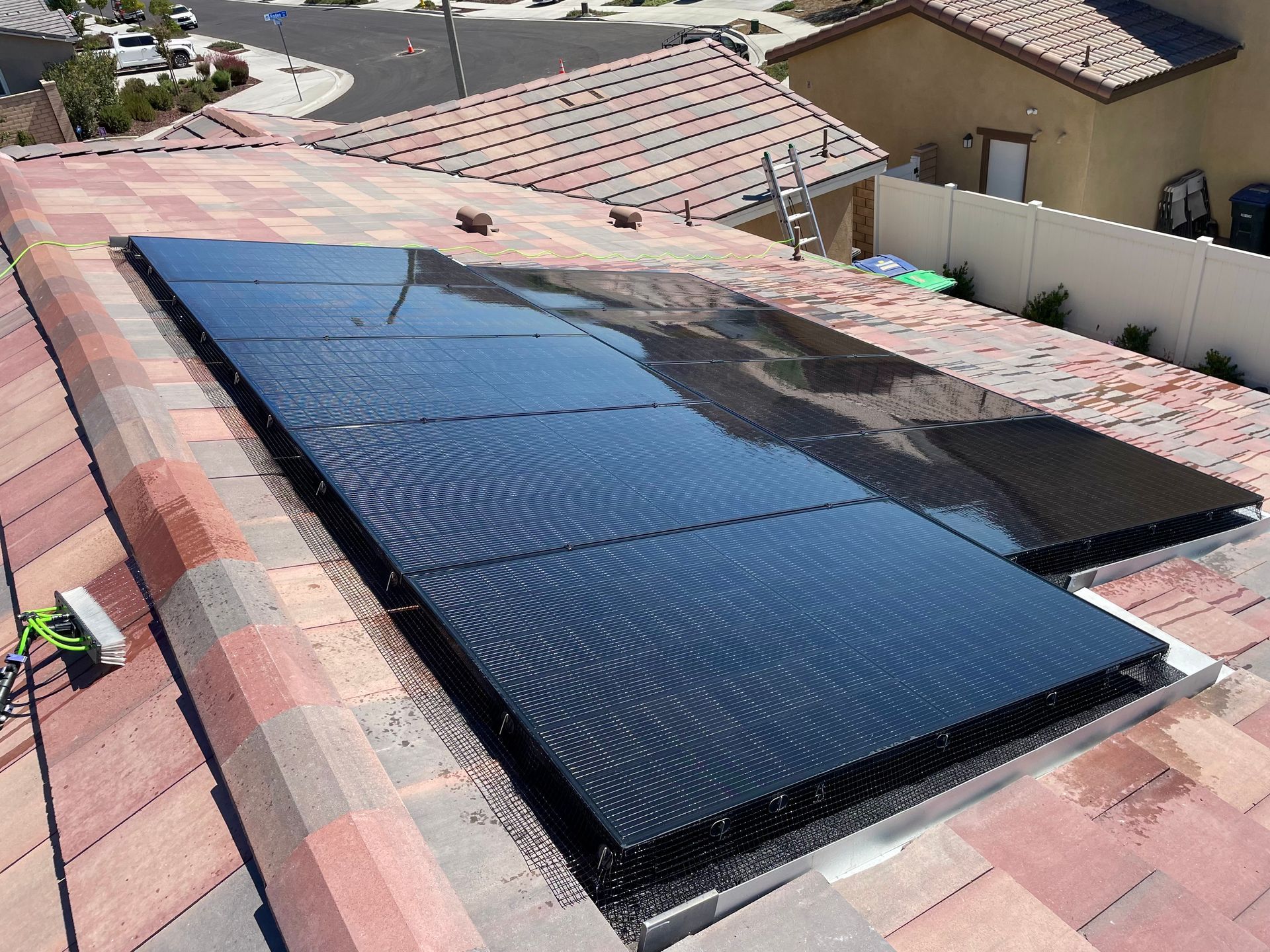 A roof with a lot of solar panels on it