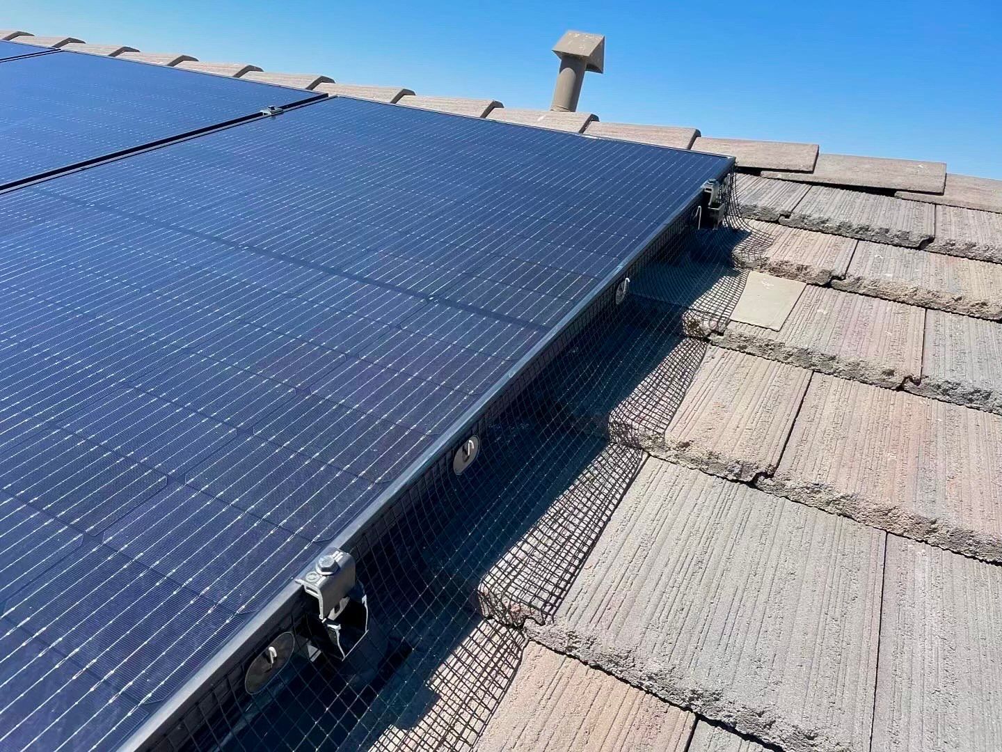 A close up of a solar panel on a roof.
