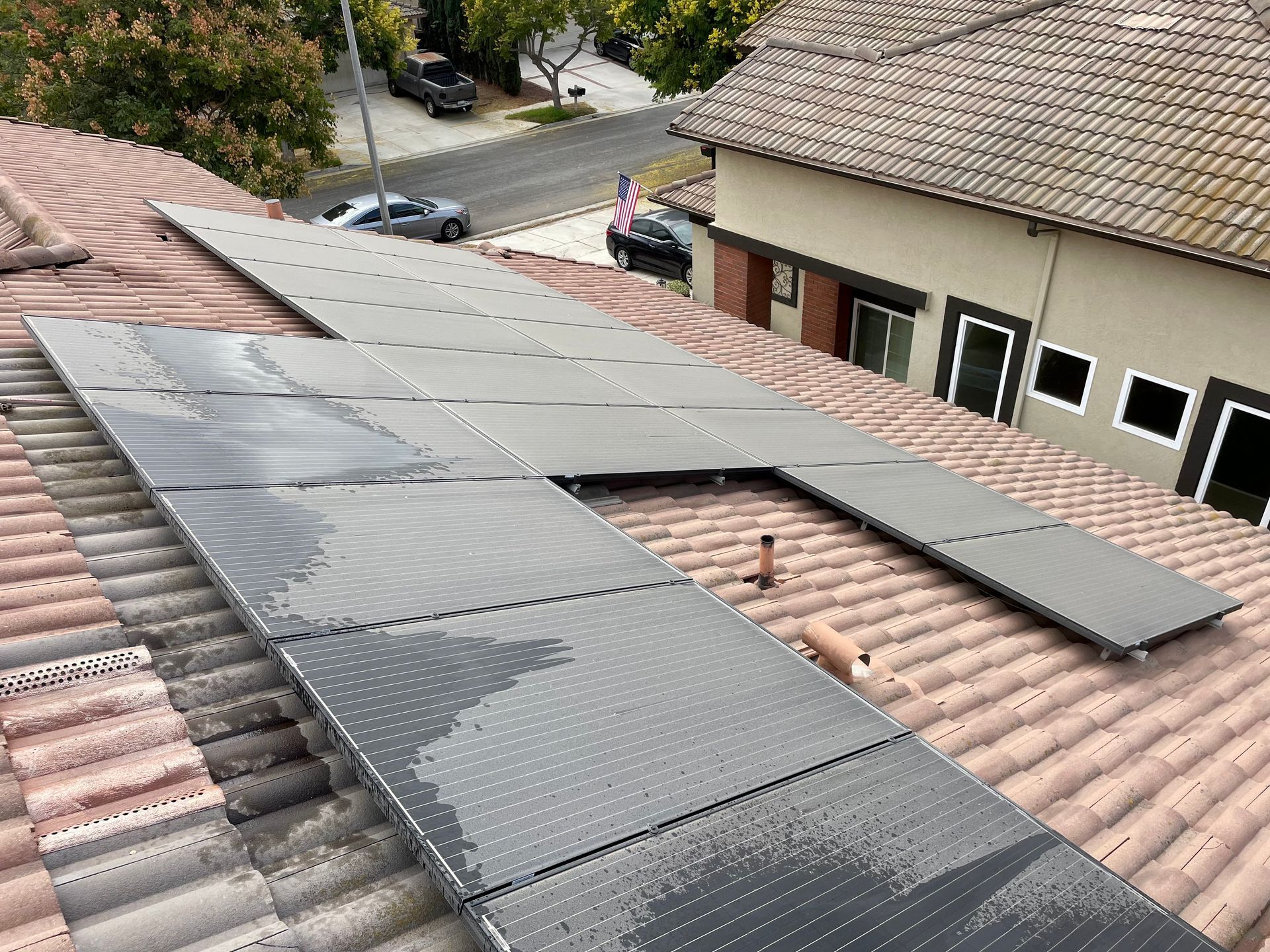 A roof with a lot of solar panels on it