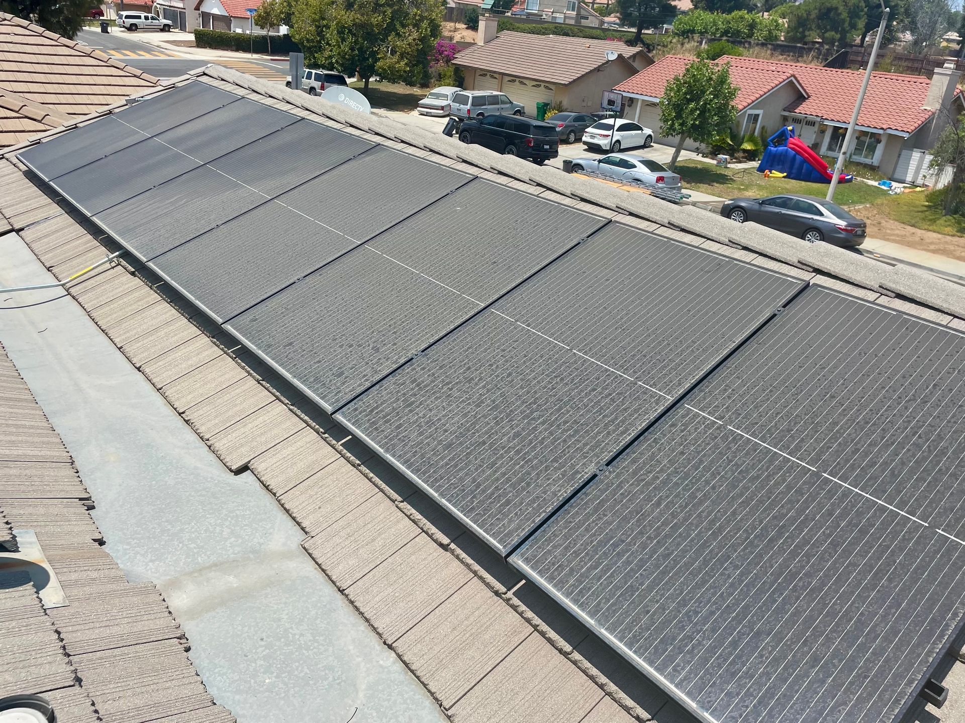 A roof with a lot of solar panels on it