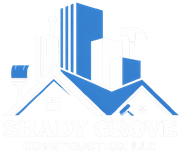 Logo: Gold crown over a semi-truck carrying an excavator, with the word 