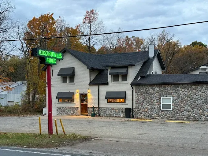 Bar exterior with a green 
