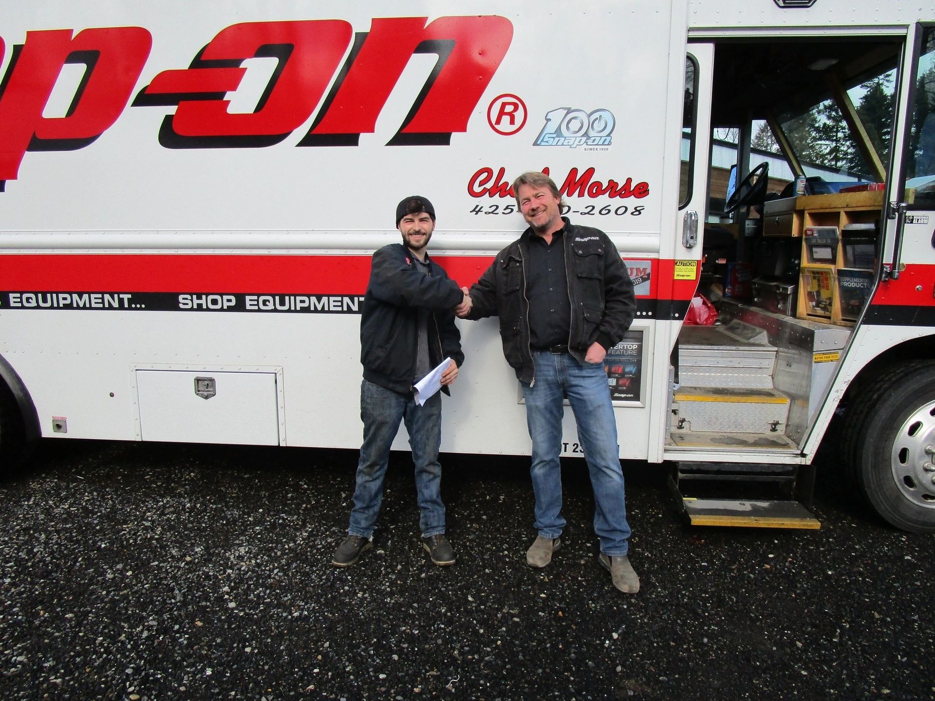 Two people shaking hands | Eastside Speedshop LLC