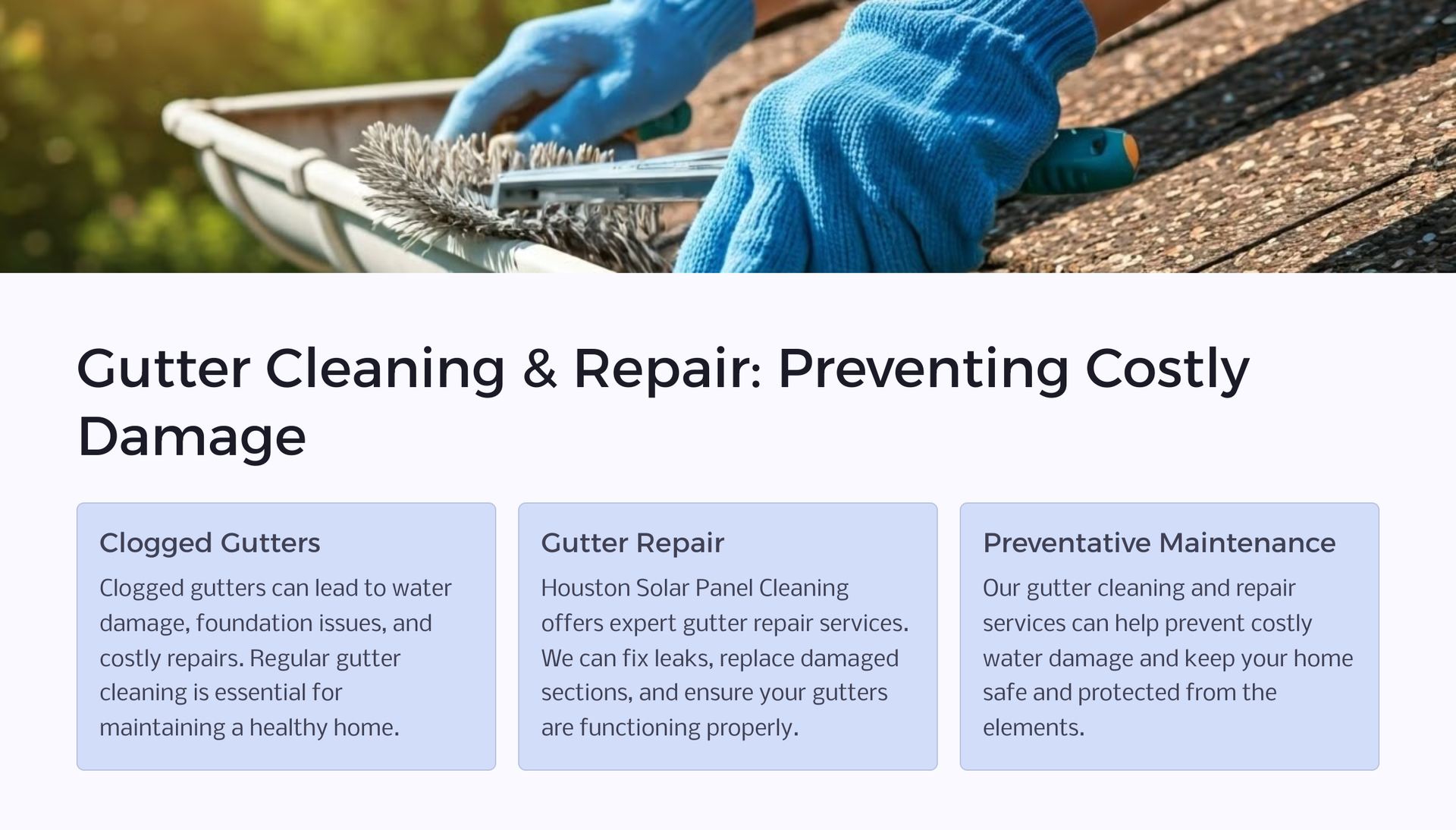 A person wearing blue gloves is cleaning a gutter on a roof.