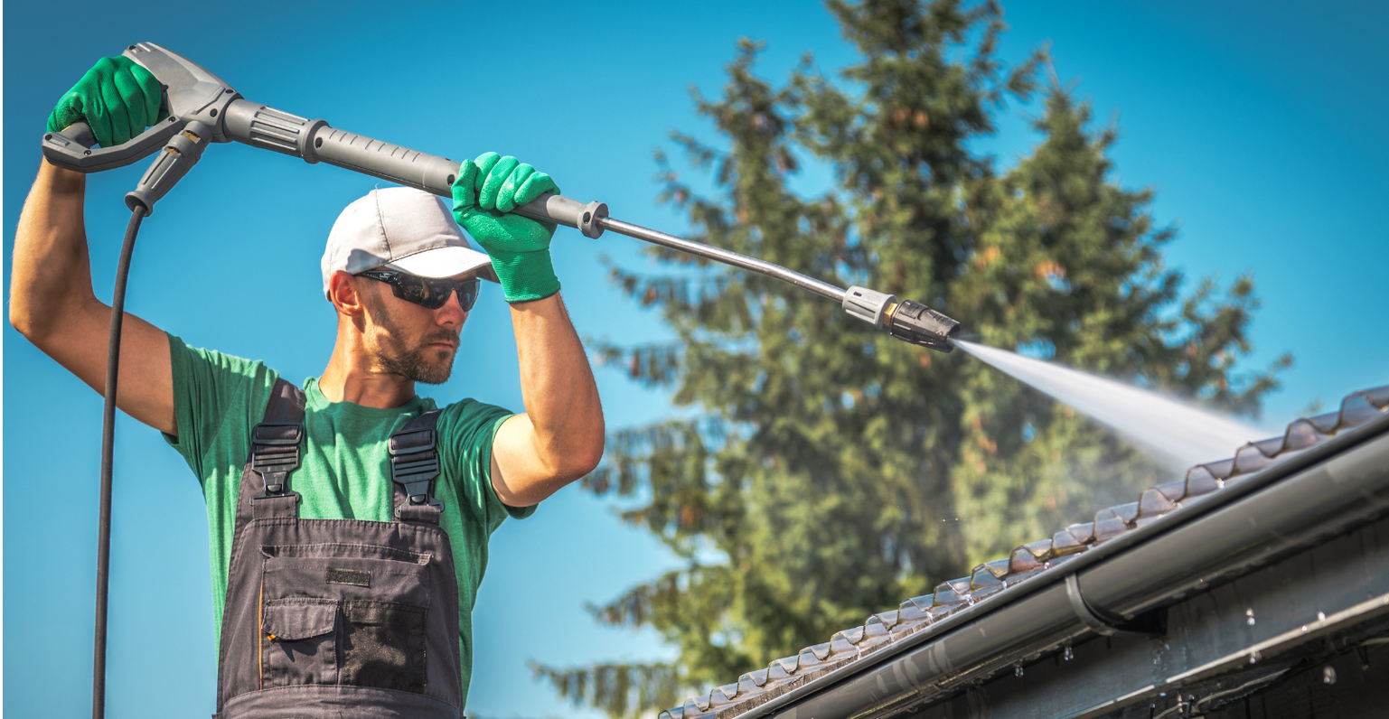 Power Washing a roof and gutter on a beautiful South Texas day