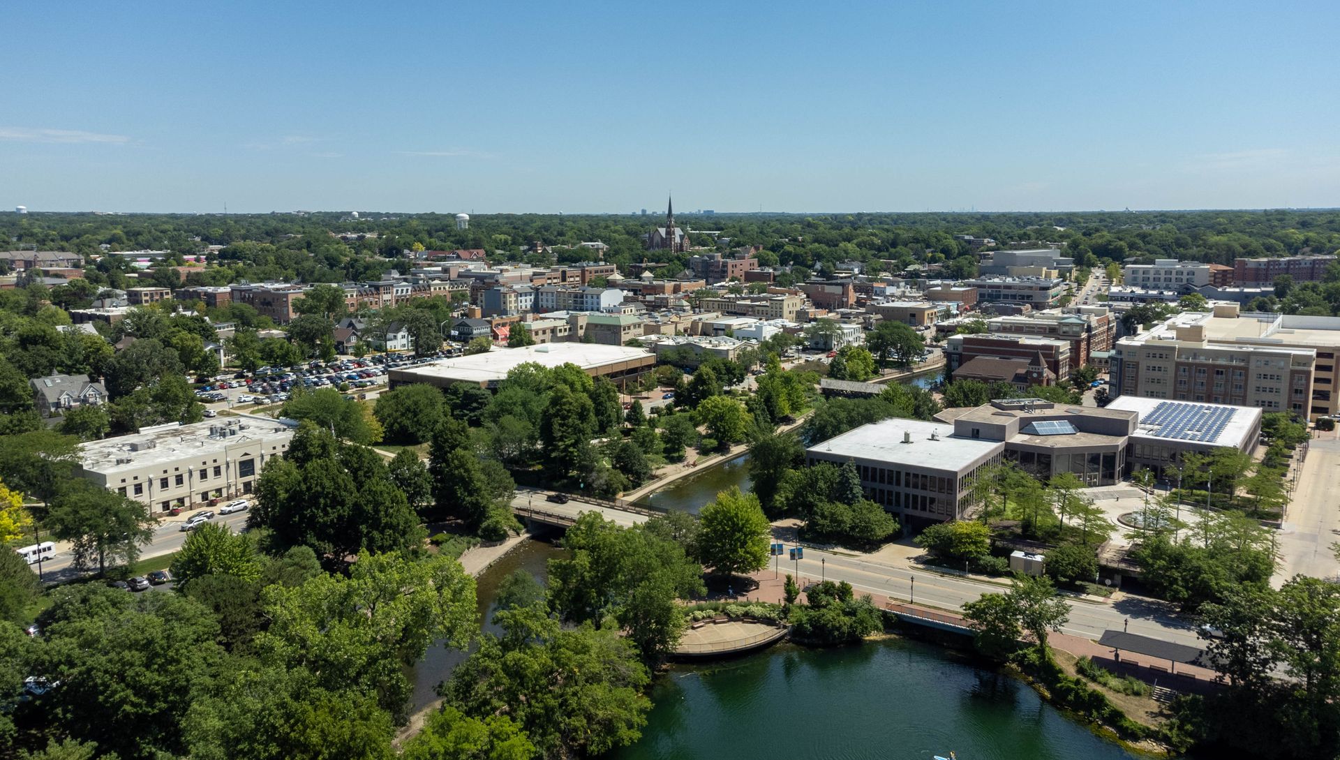 Aerial view of the Illinois State Capitol dome at sunset, overlooking the city skyline of Springfield.