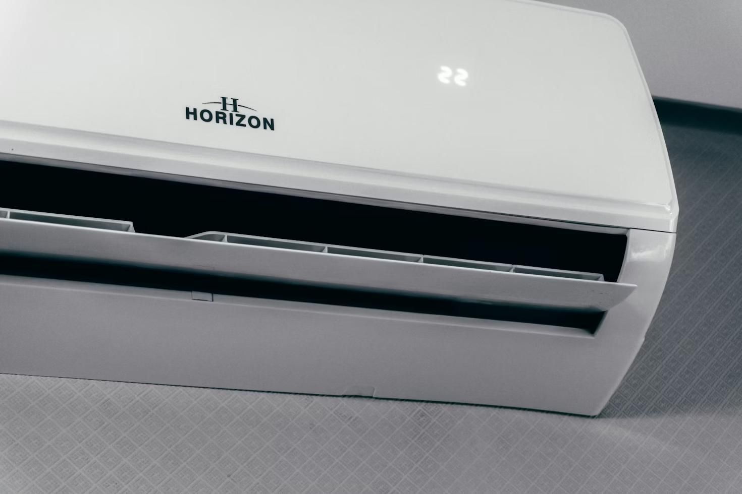 An AC unit mounted on a wall 