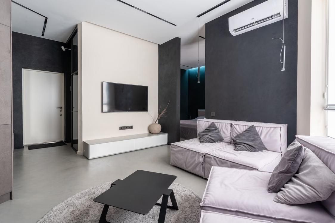 a living room with an air conditioner