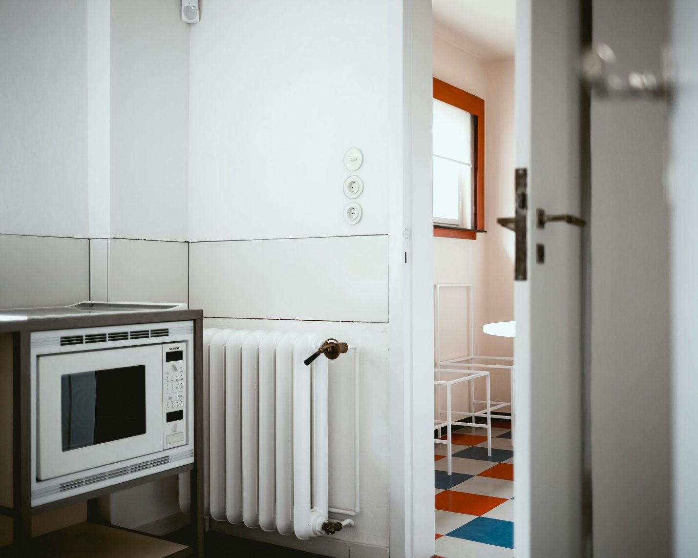 Radiator heating system integrated into a modern home designed for energy-efficient and eco-friendly HVAC performance