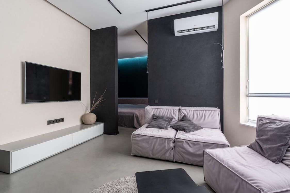 An image of a living room with an AC   