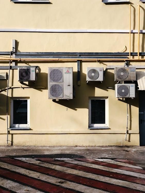 Multiple outdoor HVAC units mounted on a building