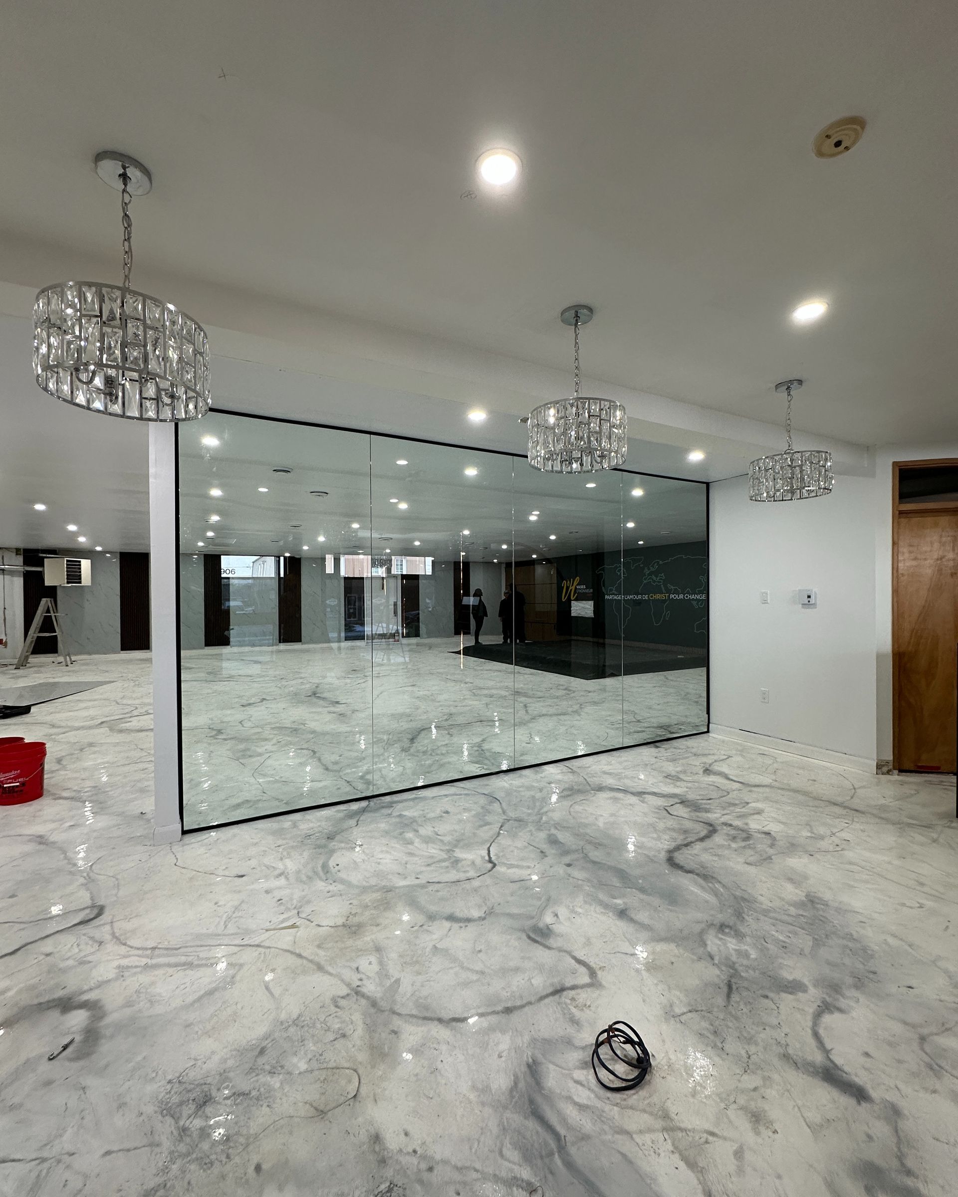 There is a large mirror in the middle of the room.