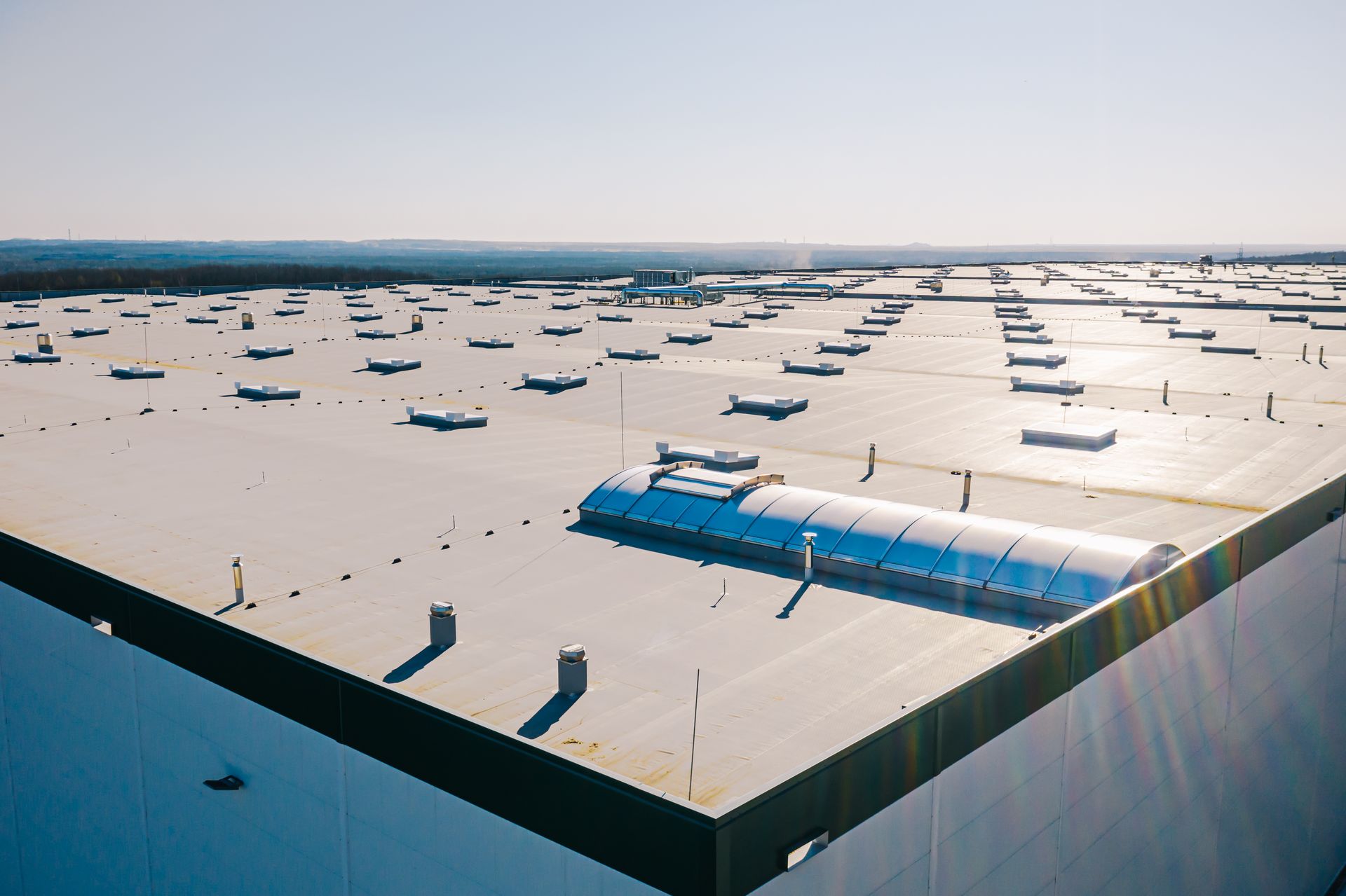 An aerial view of the roof of a large building.