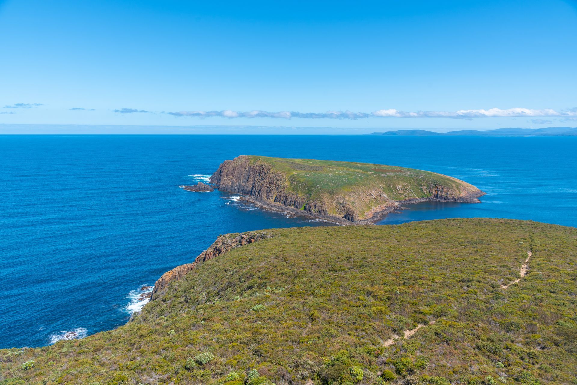 Cliffs of Bruny Island viewed from Cape Bruny Lighthouse in Tasmania, Australia.