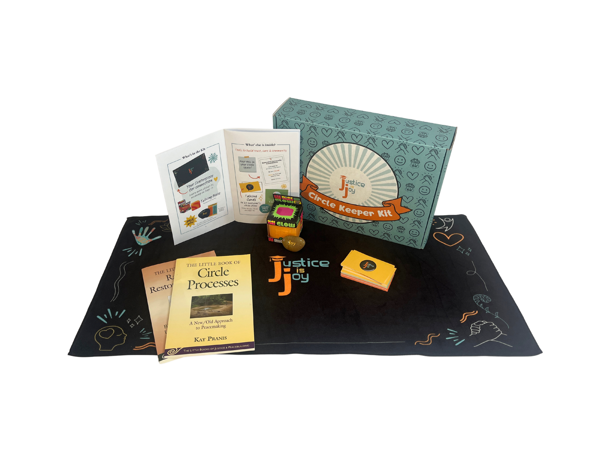 A box with the letter j on it sits on a table
