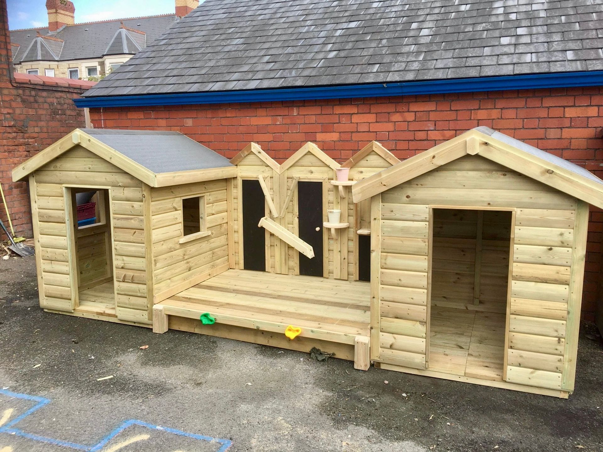 Twin Beach Huts and Sandpit Stage