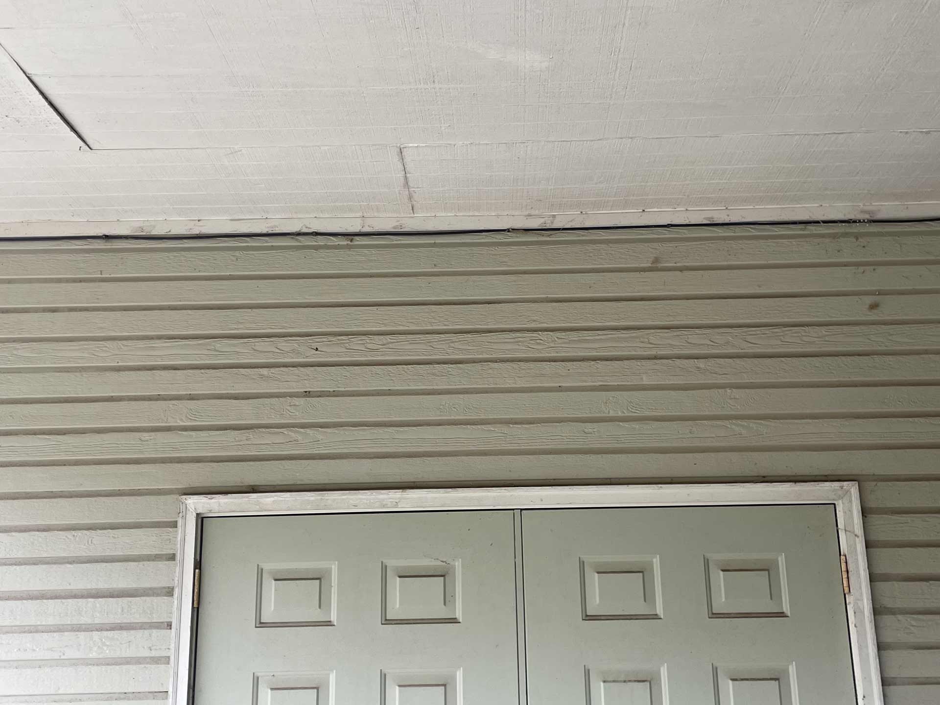 A door on the side of a house — Decatur, AL — Dynamic Pressure Washing & Roof Cleaning