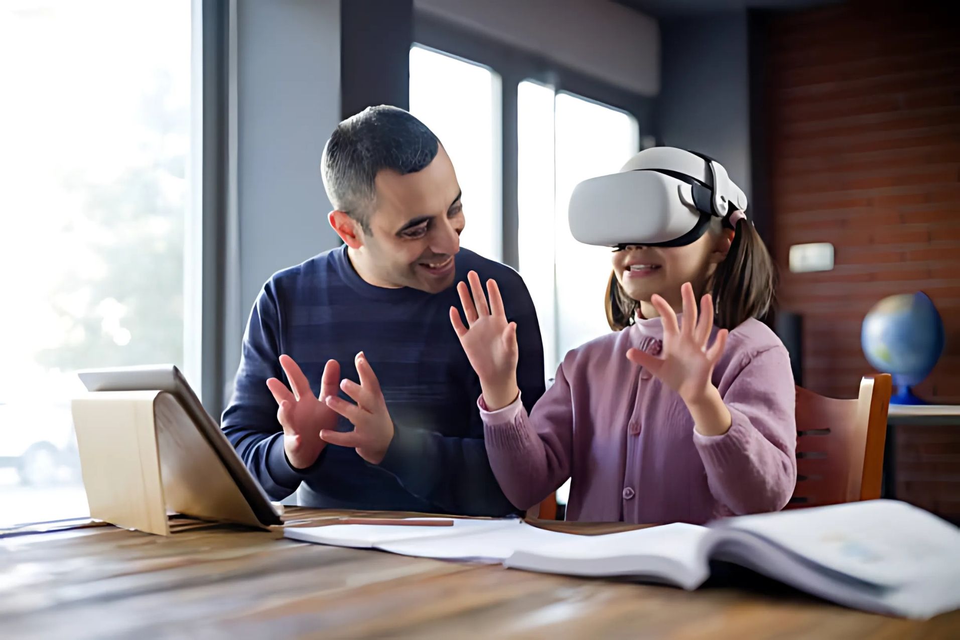 A man is teaching a little girl how to use a virtual reality headset.