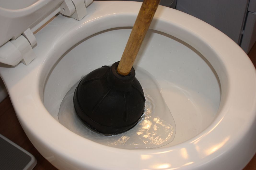 Blocked toilet can be repaired by your local plumber in Plymouth