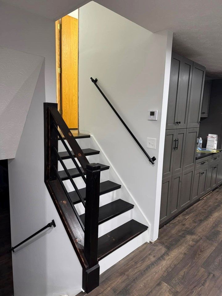 A set of stairs leading up to the second floor of a house.