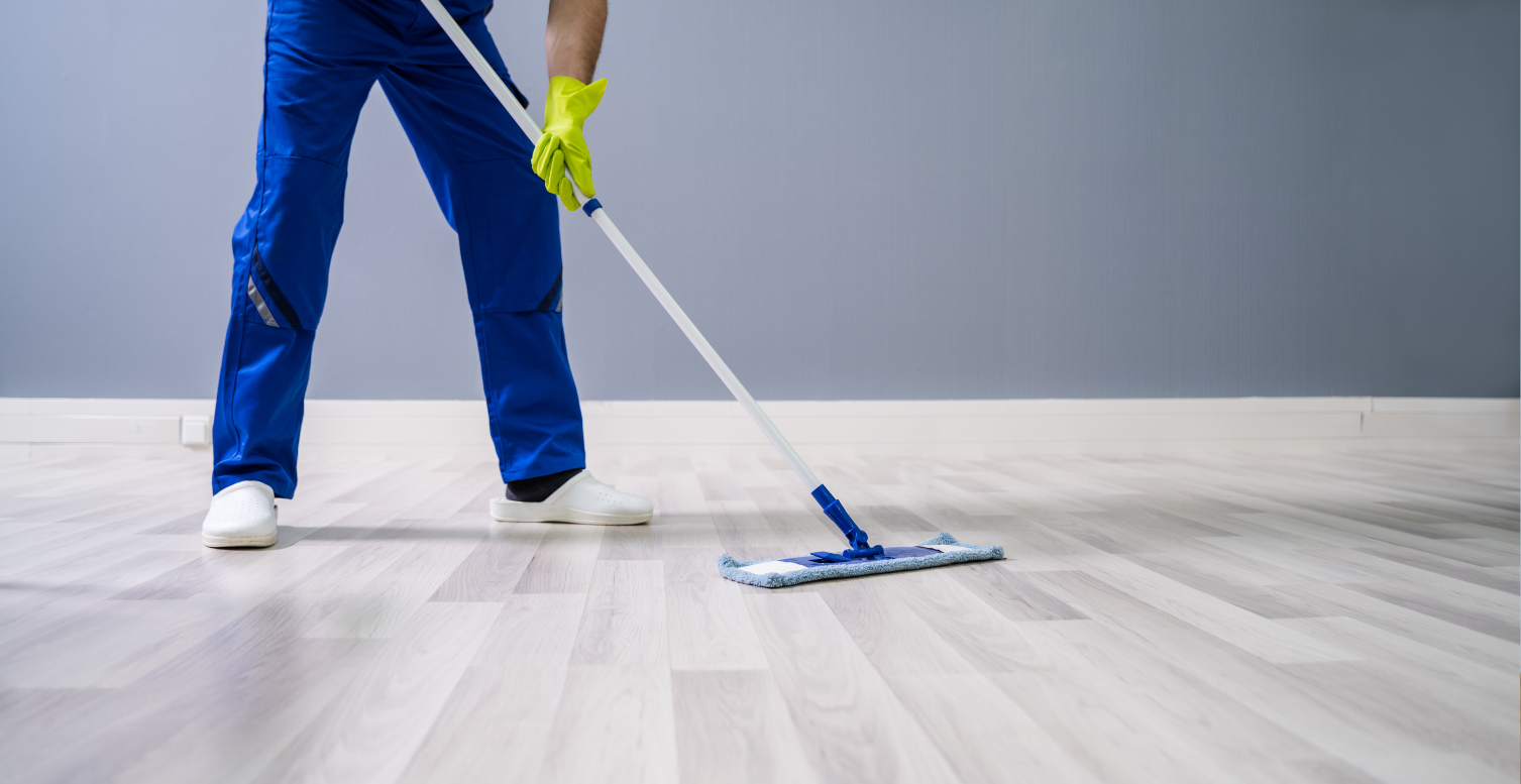 A person using a vacuum cleaner to clean a mattress, effectively removing dust, dirt, and allergens.