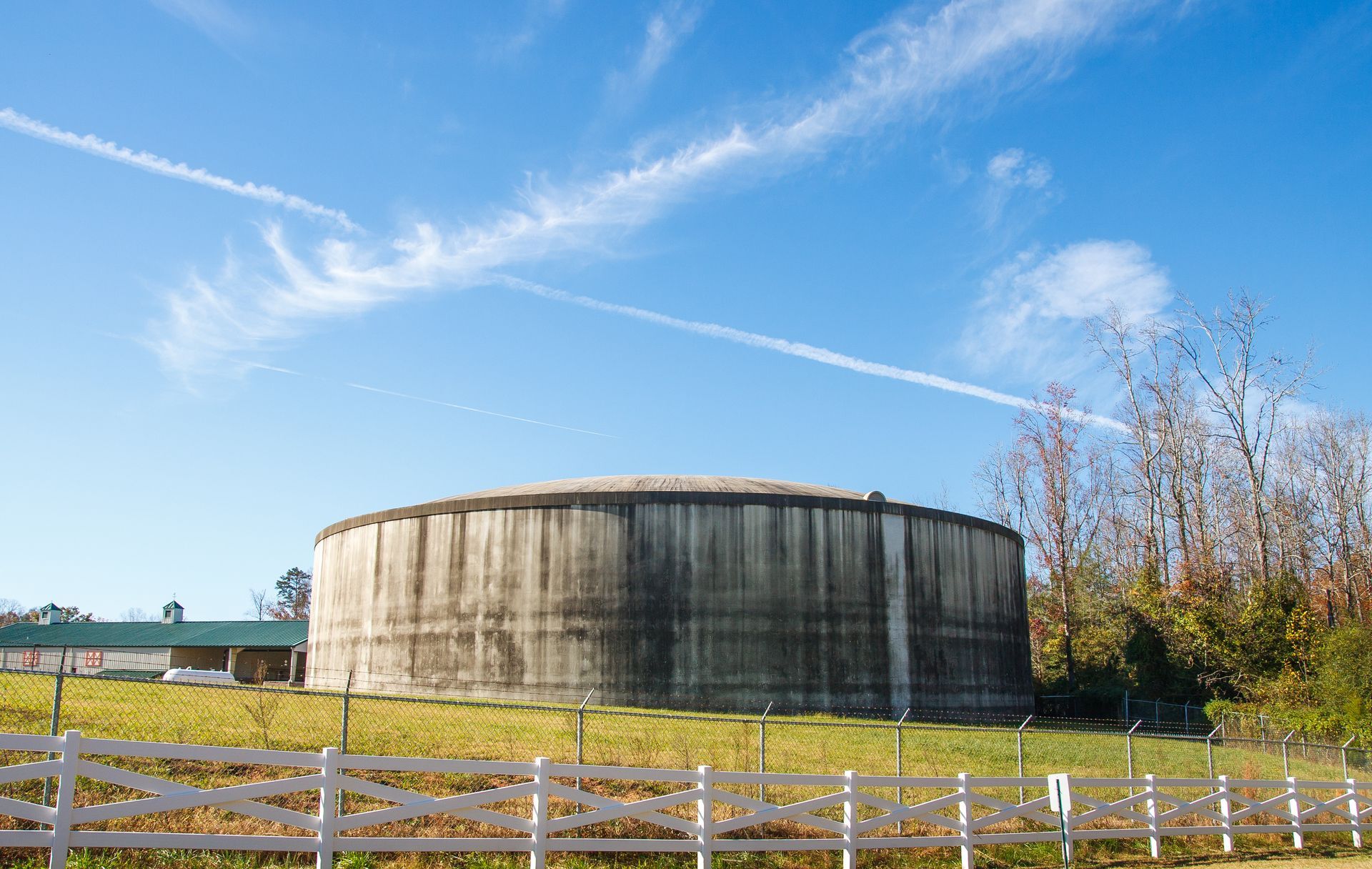 A round concrete water tank. A round concrete water tank.