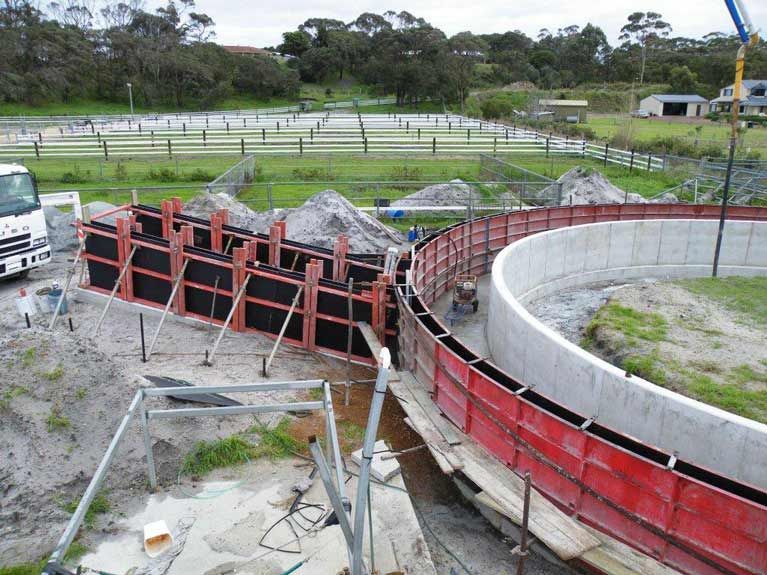 A Large Circular Structure Is Being Built In A Field – Perth, WA - Armadale Concrete Tank Co.