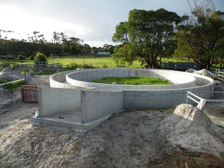 A Large Concrete Structure Is Being Built In A Field – Perth, WA - Armadale Concrete Tank Co.