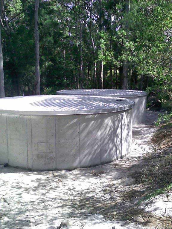 A Concrete Structure In The Middle Of A Forest – Perth, WA - Armadale Concrete Tank Co.