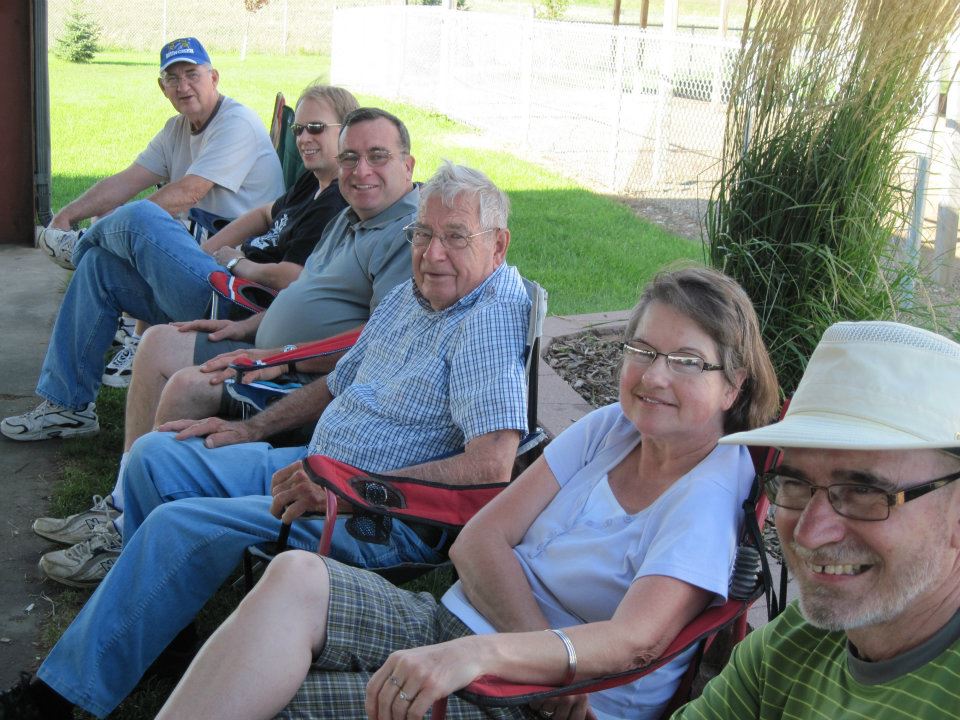 adult ministry sitting in camp chairs