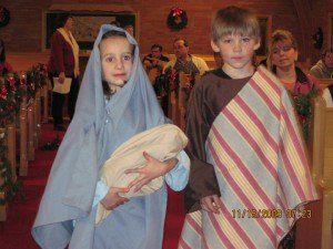 children playing mary and joseph in christmas play