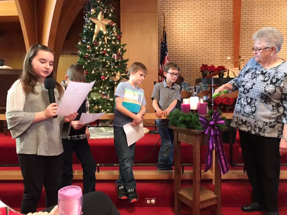 children singing in a church