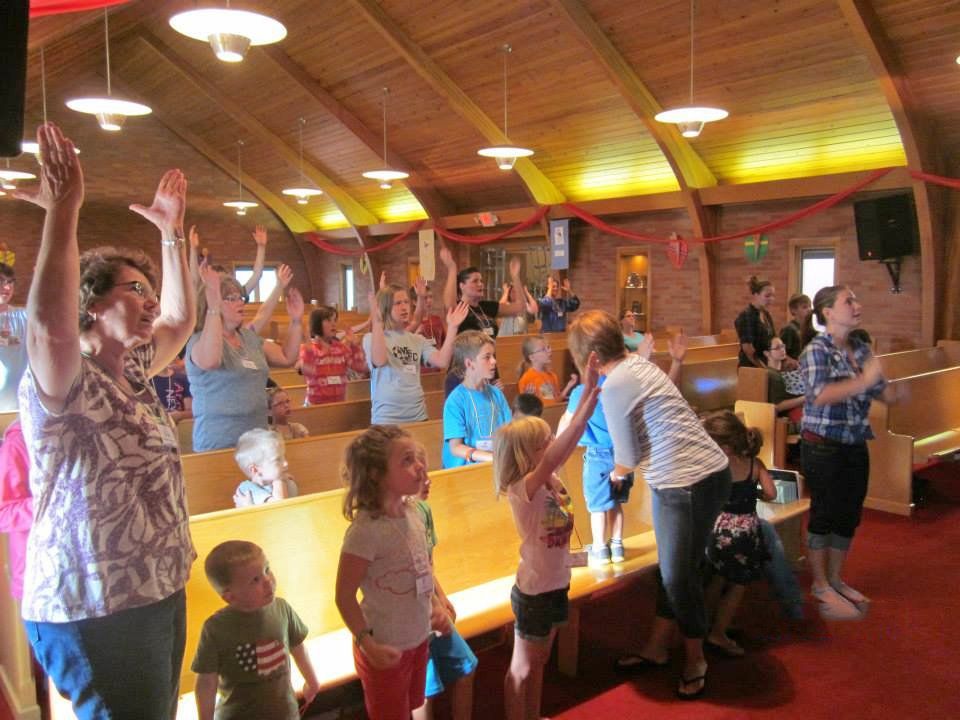 kids singing in a church