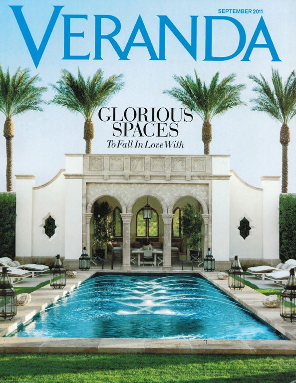 The cover of veranda magazine shows a pool and palm trees