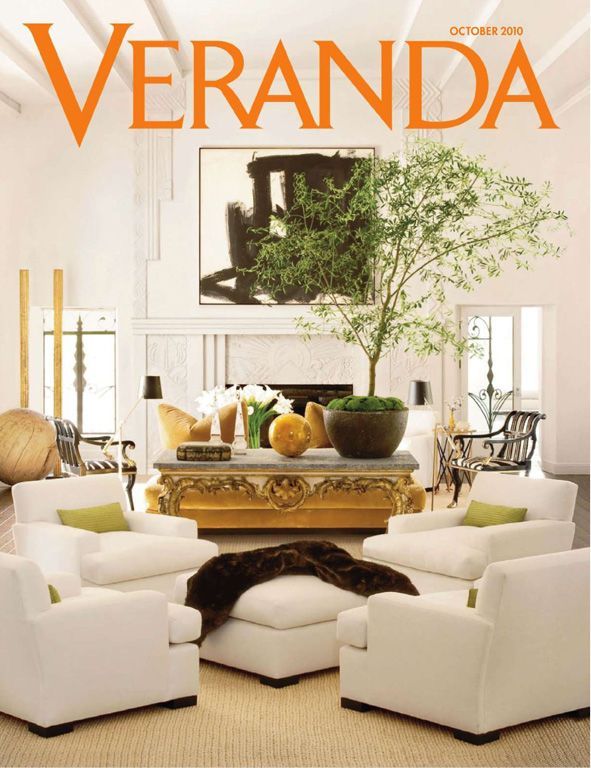 The cover of veranda magazine shows a living room with white furniture