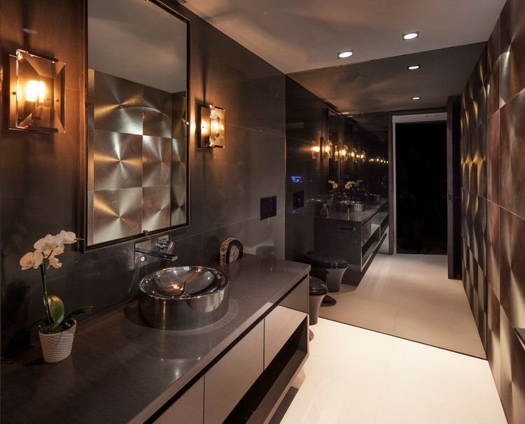 A bathroom with two sinks and a mirror