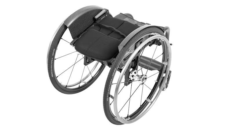 Black and silver wheelchair, folded, with large rear wheels and a dark seat.