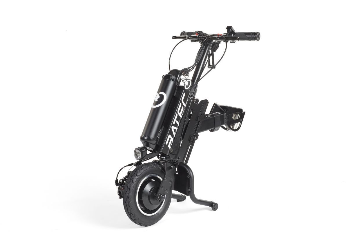 Black, folded electric scooter on a white background.