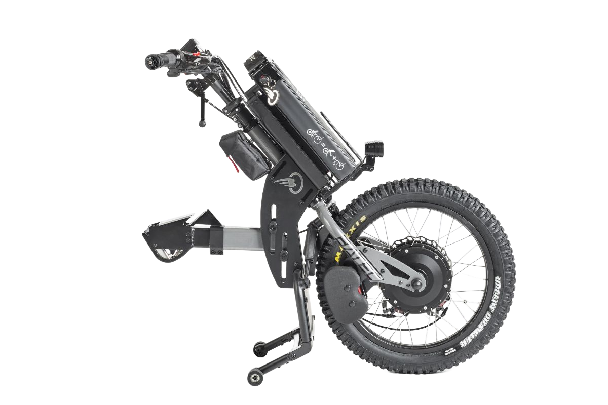 Motorized wheelchair attachment with a large rear wheel, black frame, and batteries.