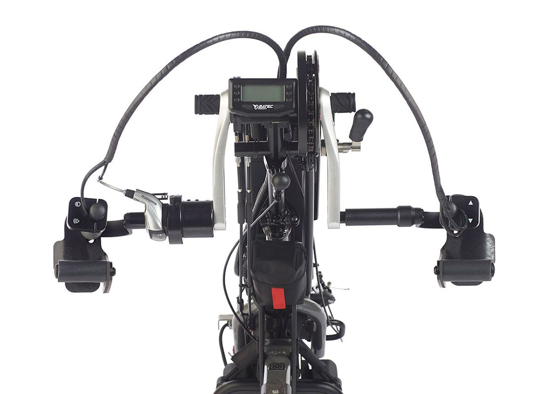 Top view of a black handcycle with handlebars, a display, and black components against a white background.