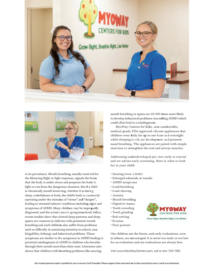 Two women are standing next to each other at a counter in a hospital.