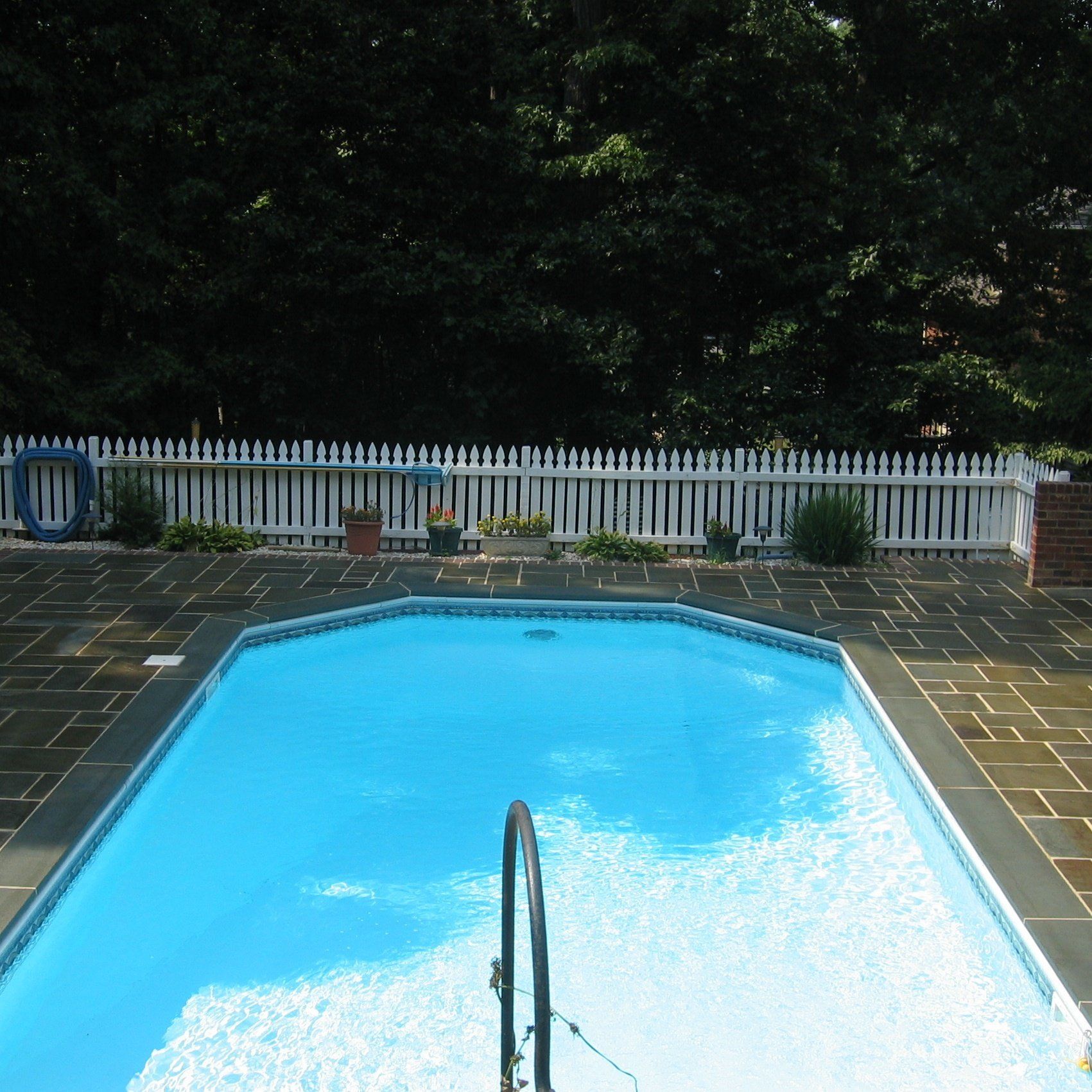 Pool — Modern Lounge Chairs Next to Swimming Pool in Richmond, VA