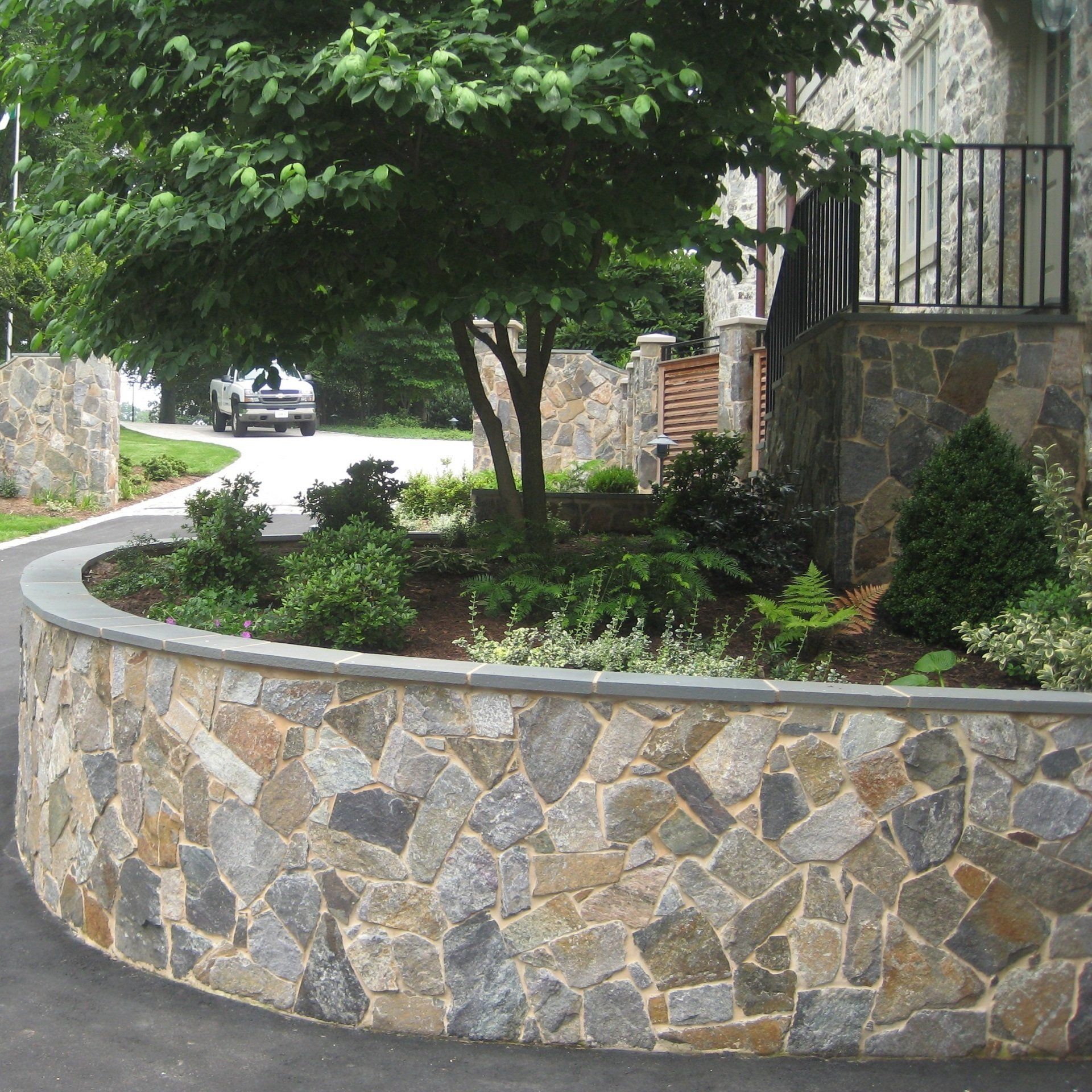 Retaining Walls — Retaining Wall with Light and Flower in Richmond, VA