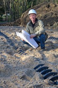 Man Inspect Underground Septic Tank — Greenville, SC — American Waste Septic